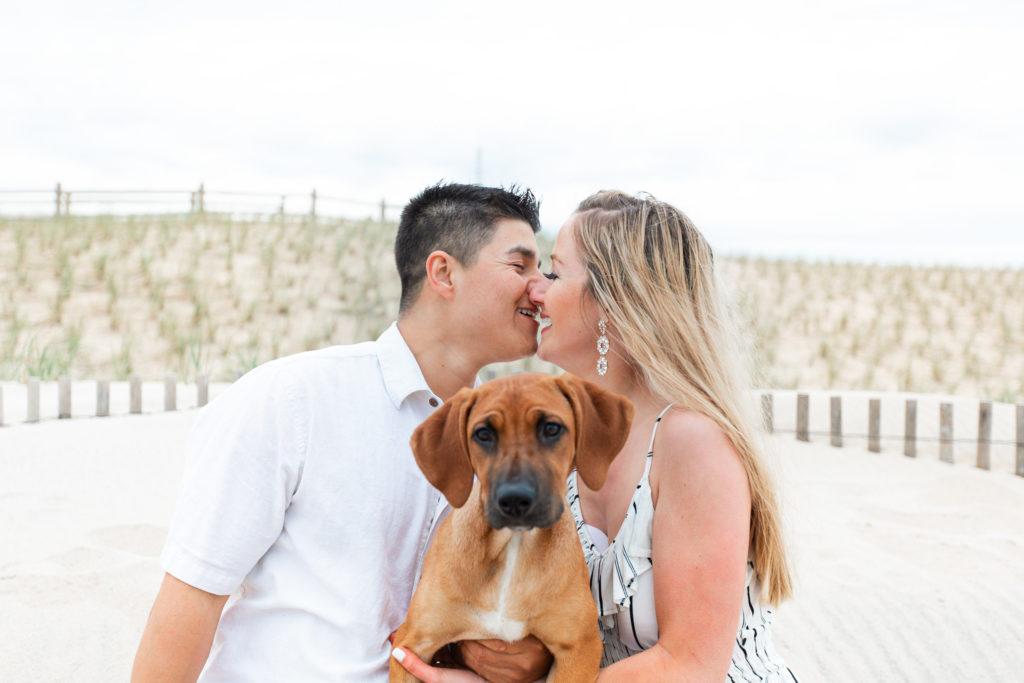 engagement session with dog at the beach