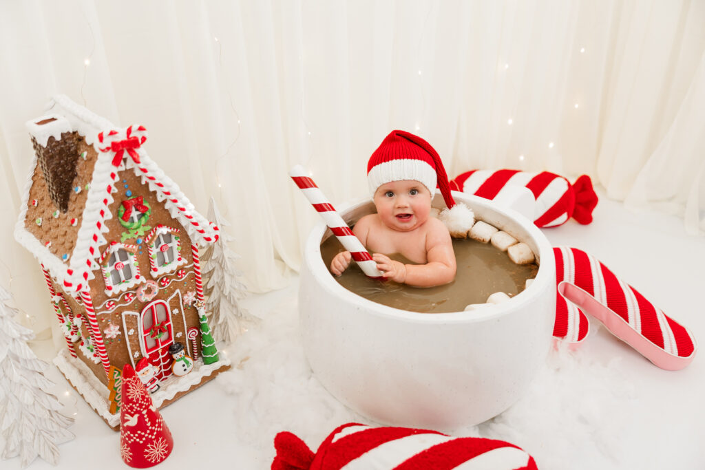 baby christmas photo ideas, giant hot cocoa baby, baby in giant hot cocoa cup